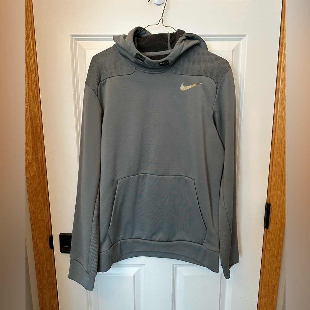 Men’s Nike gray pullover hoodie, size Medium.